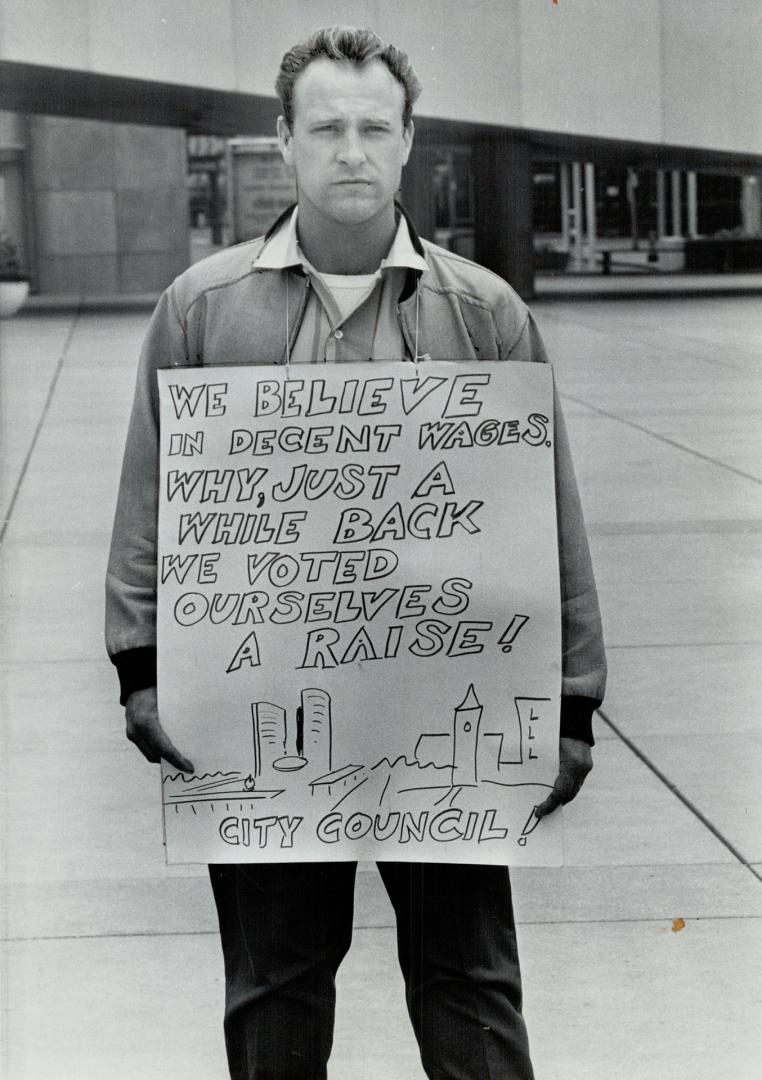 A Me-Too picketer, Striking worker at City Hall