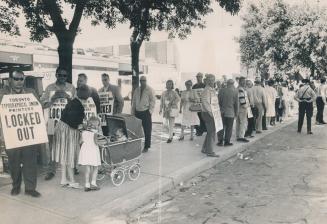 Their Picketing's A Family Affair, Striking Printers, members of International Typographical Union, are joined by their women and children as they pic(...)