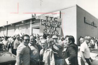 Defiant TTC strikers leave a union meeting yesterday in a Scarborough curling rink at which they voted to hold a secret ballot tomorrow on whether to (...)