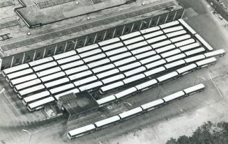 Buses are neatly parked during strike--a strike that cost community millions