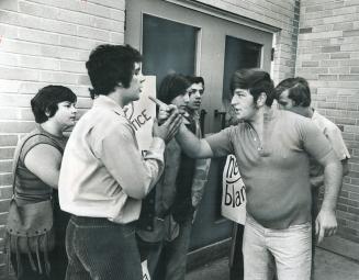 Angry students confront each other outside secondary school in Sturgeon Falls as one student emphasizes his disagreement with the student strikers by (...)