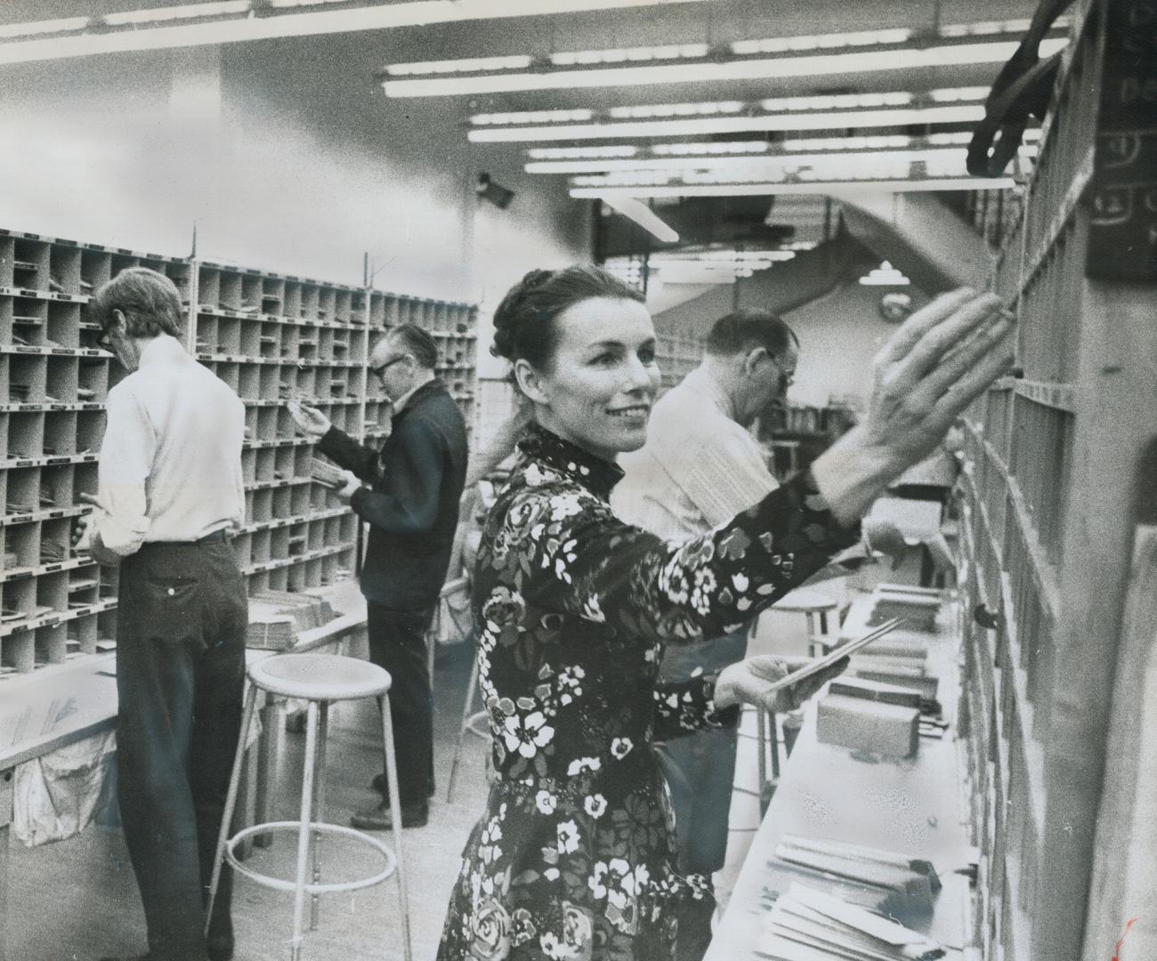 Back sorting the mail, Jean Hill works with other postal employees who crossed the picket line at Don Mills post office