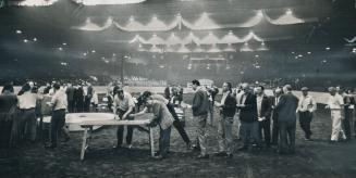 Shouts of jubilation - sure to be echoed by most of Metro's mail-less residents - fill te CNE's Coliseum (top) as Toronto postmen learn their vote tod(...)