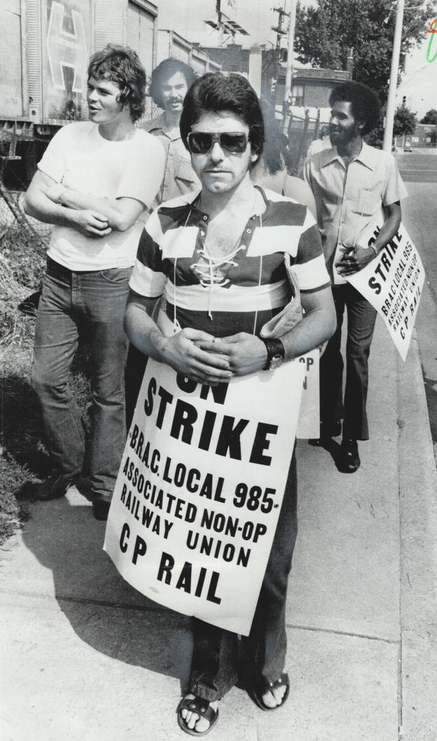 Union members walk a picket line during the last railway strike, in 1973, when they were legislated back to work after 10 days. The chief union negoti(...)