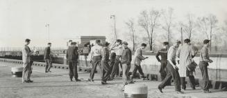 Lining the Canal Bank at Thorold, pickets are ready to pelt the Glenelg and her crew