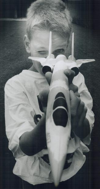 Space cadet, Budding scientist Oliver Helmrath, 10, checks out his Gray Hawk rocket yesterday at Upper Canada College's Space Camp, which runs for two weeks