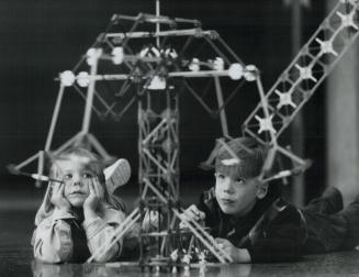 Bigger than a breadbox, Meaghan Walford, 3, and her brother Jacob, 6, use K'Nex construction set at the Ontario Science Centre