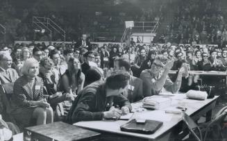 Students at the last session of varsity's teach-in on china applaud chester ronning's retort to American speaker, The audience of 3,000 cheered the fo(...)