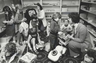 Childs paradise: Patricia Phillips helps son Stephen choose a toy at Jane-Dundas library