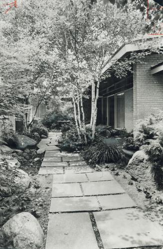 Entrance courtyard of the George Hamanns' city house is one of five around which the house was designed