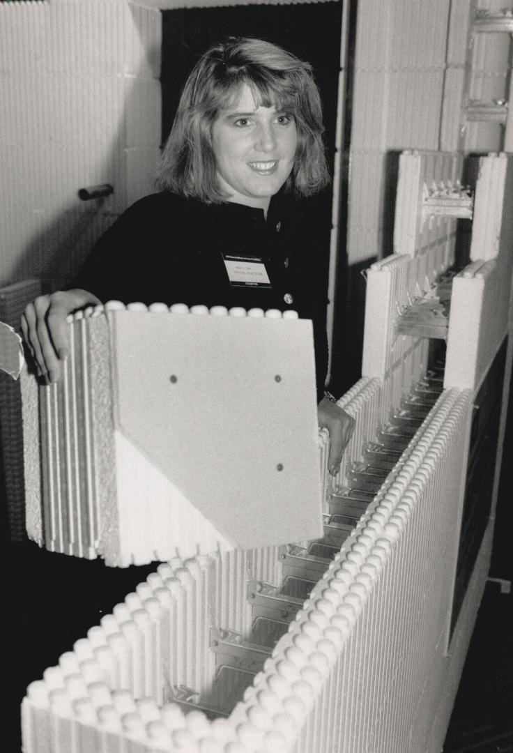 Green light, Robyn Roby displays the Argisol solid wall construction system at the Toronto Homebuilders' annual gathering. The system has won Canadian approval