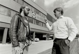 Bad news: Martin Cosby (left), an assembler at de Havilland Aircraft is one of 400 workers to get layoff notices last week