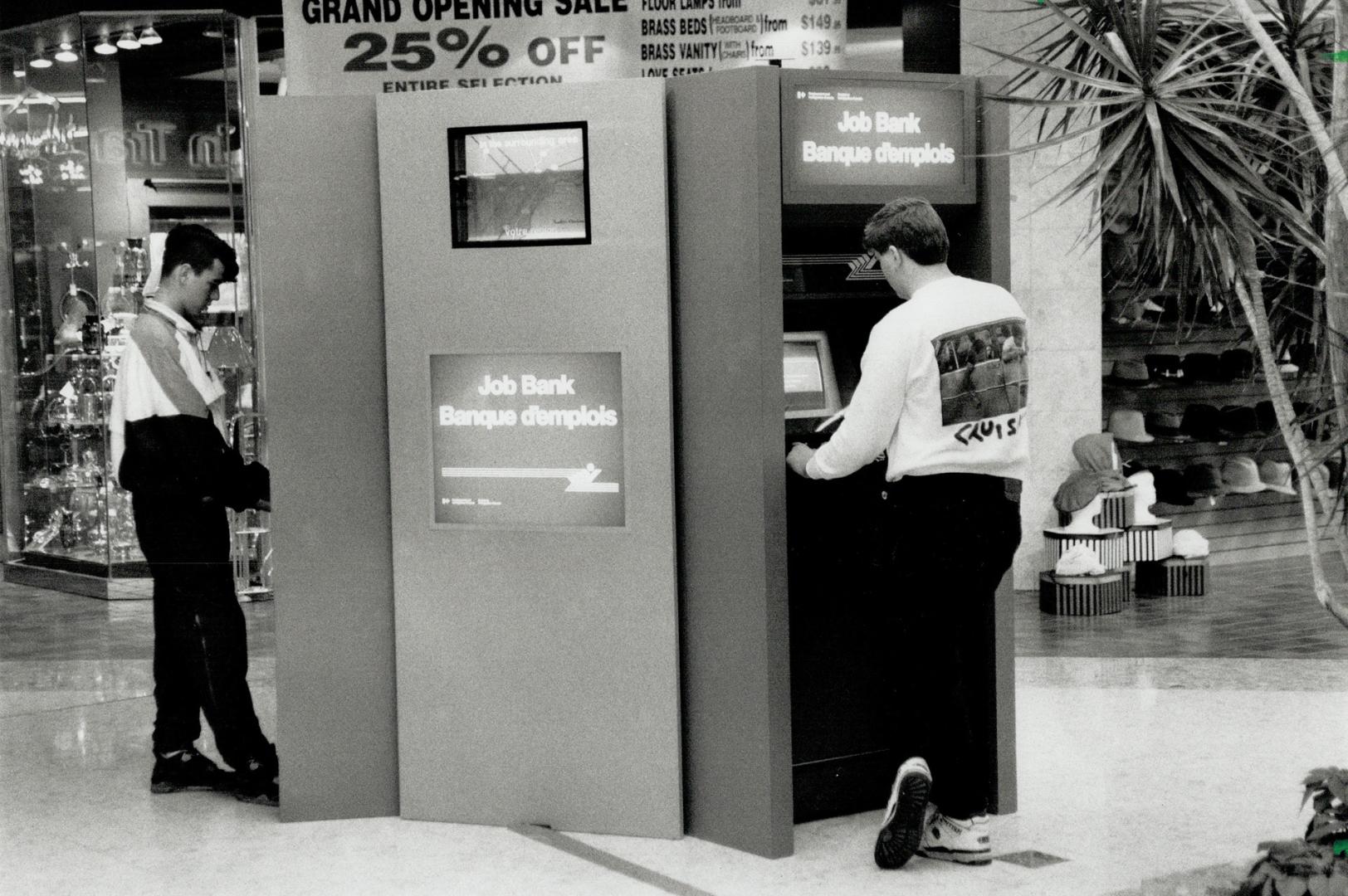 Job seekers: Customers at the Square One shopping Centre are using Canada's first stand-alone computer containing thousands of job listings across Canada