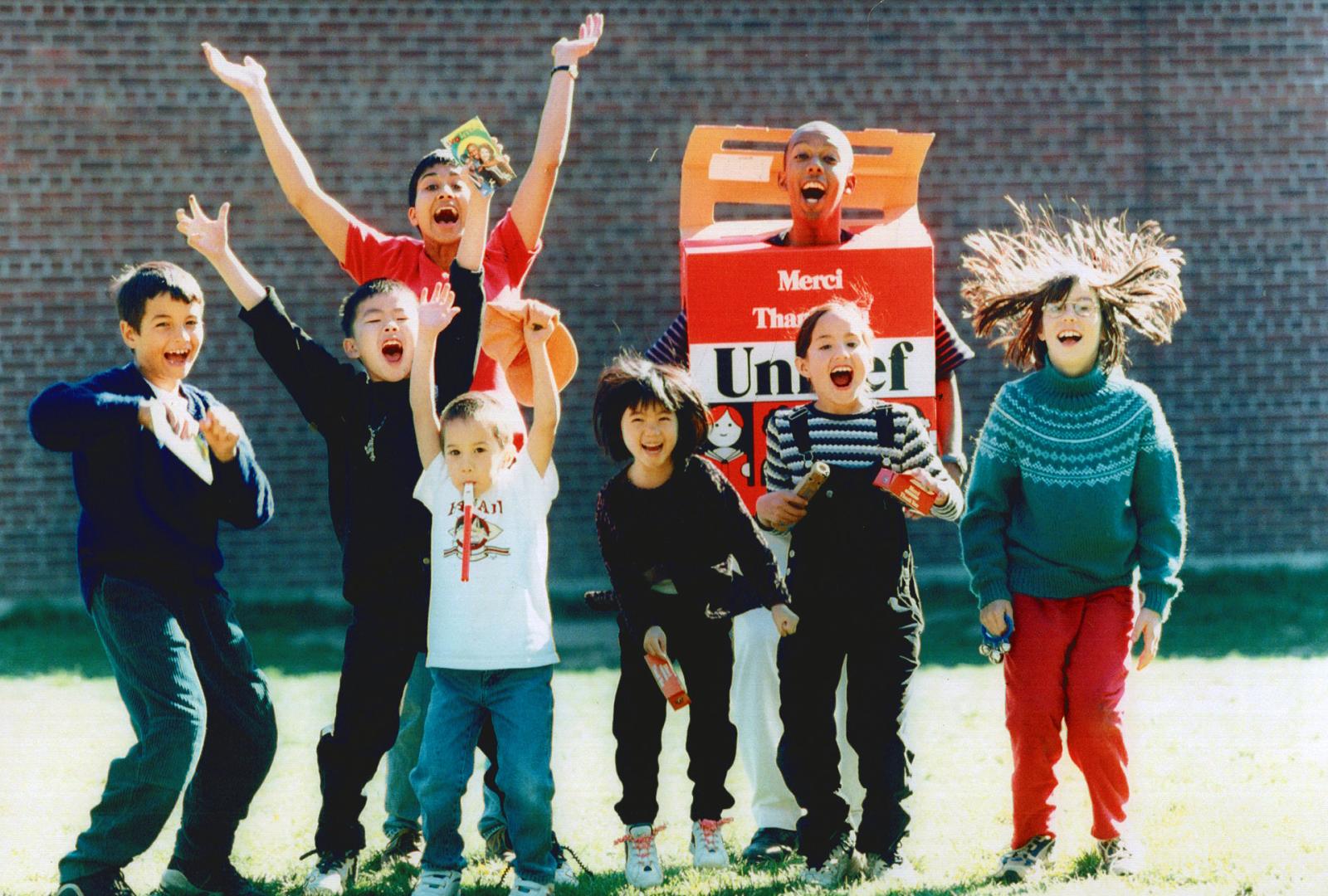 They're pumped up for tricks AND treats!, TVO Kids performer Joe Motiki prances in an orange box while educating pupils on the virtues of UNICEF fundr(...)