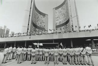 At Ease: The 250 gulf war veterans honored in Nathan Phillips Square yesterday get a warm welcome from residents and dignitaries