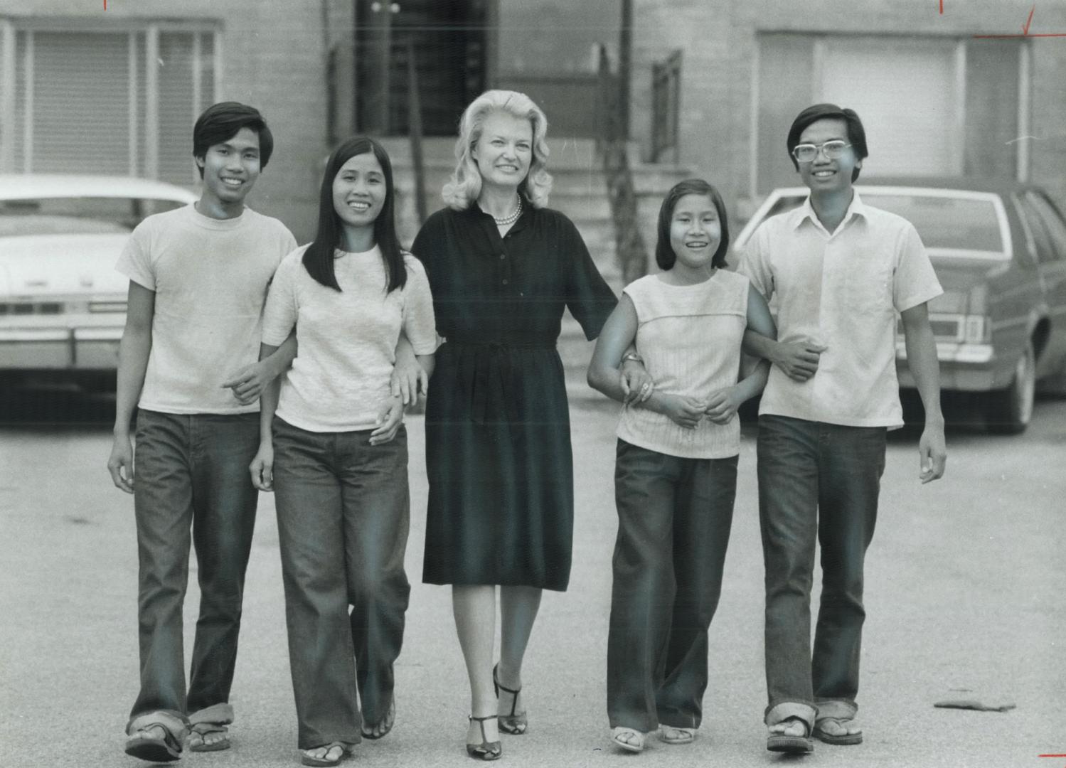 Refugees Nghiem Phong, Nghiem Kinh, Nghiem Trang and Nghiem Toan with sponsor Louise Cornblum