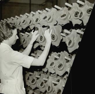 Bottom, ever-growing stores of gas masks