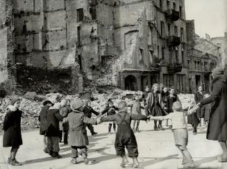 Nations, rich in resources, were appealed to by the pope to institute food rationing to help ease the threat of world famine. These children playing i(...)