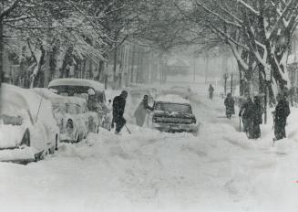 All-too typical of the side streets throughout Metro today is this scene on Albany St