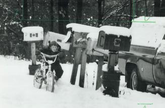 Shane Mieske, 9 of Gormley snow too deep - missed school car got stuck in Driveway