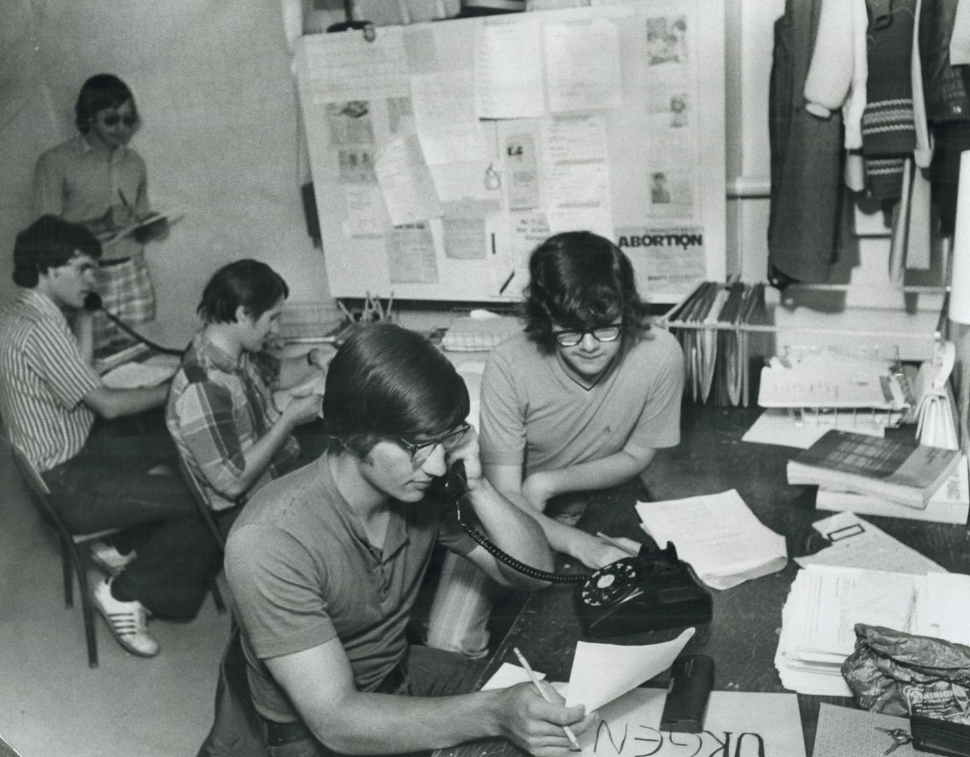 6 Action Centre in the basement of a home in an OHC housing development students run a referal service for welfare recipients. They are from Left to r(...)