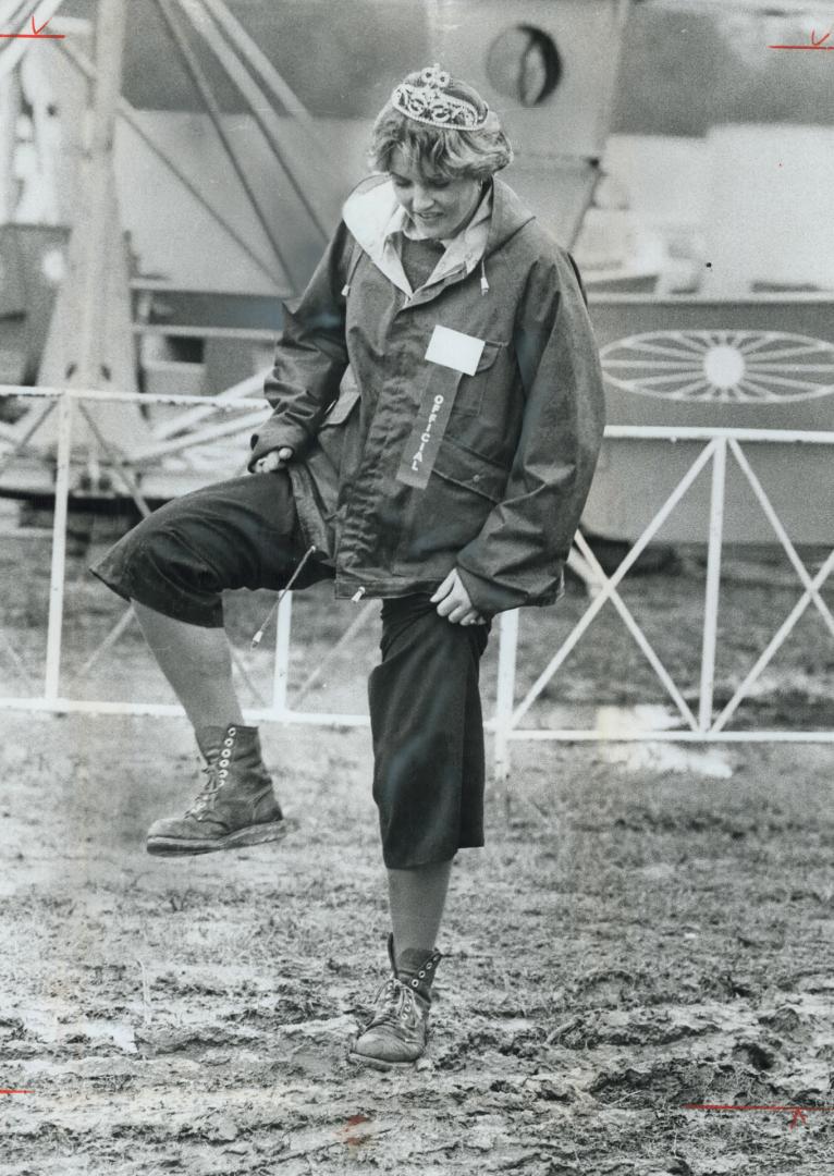 She's queen of the mud, The weatherman forecasts a good day for the Woodbridge Fair today, but yesterday it was a washout