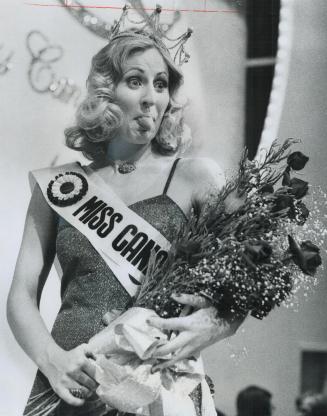 Miss Canada is speechless!, Sticking out her tongue, 22-year-old Terry Lynne Meyer of Edmonton greets her selection s Miss Canada last night