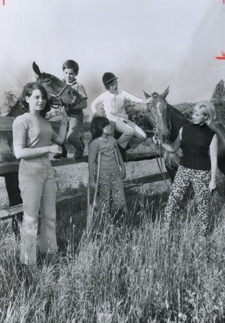 Here's Miss Toronto 1950, Ruby Mann, right, as she was as a beauty queen and as she is now-mother of four children who lives on a farm at King. She's (...)