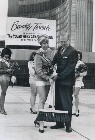 Brushoff from a beauty, The big city's grime gets the brushoff from Alida Greene and Controller William Dennison at City Hall today