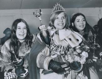 Toronto crowns a carnival queen, Toronto's Miss Carnival Queen, 14-year-old Kathy Powers of Annette Recreation Centre, is flanked by two princesses la(...)