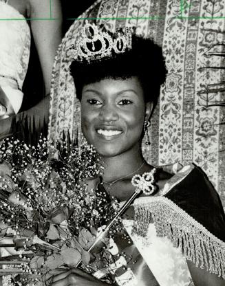 Judy Lewis, 20, of Toronto beat nine other contenders to win the title of Miss Caribana at the Royal York Hotel last night. The Caribana festival continues through the weekend