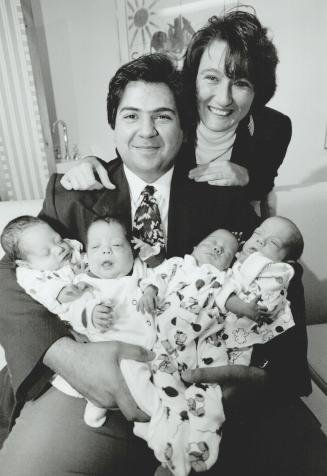 Proud parents Joe and Giovanna Soares and their quadruplets, from left, Alexander, Reyanna, Dlandra and Zachary at Women's College Hospital yesterday.(...)