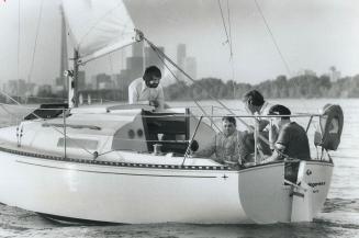 Seamanship isn't only for the sighted, as two blind sailors in this picture have proven