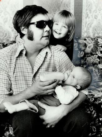 Bill Murray with daughters Tracy, 2, and Paula, 7 months Blinded in an accident 3 years ago, Murray has never seen his children's faces