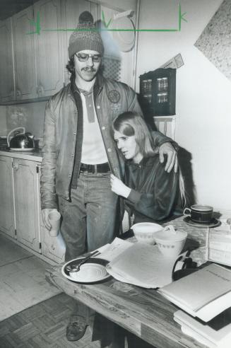 Waiting for Goldie's return, Blind woman Anne Weatherby is comforted by her husband Roland today as they await word about her seeing-eye dog Goldie, w(...)