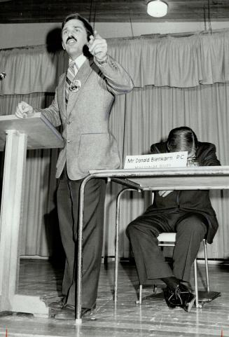 Had his say, Bill Shpikula, Marxist-Leninist, was denied seat on platform at all-candidates meeting but climbed on stage to speak anyway. Don Blenkam, MP for Mississauga South, pointedly ignored him