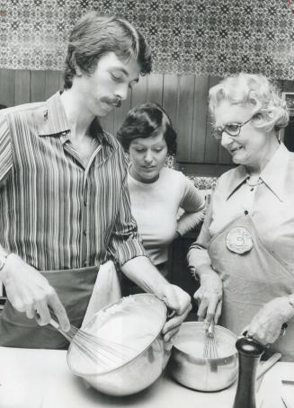 Simone Beck, (right), the authority on French cooking who is in Toronto this week