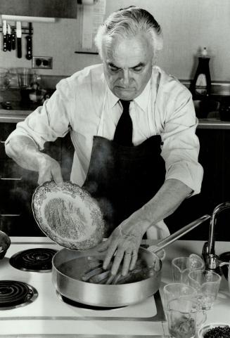 10.43 The asparagus - peeled ahead of time - is added to a skillet of boiling water