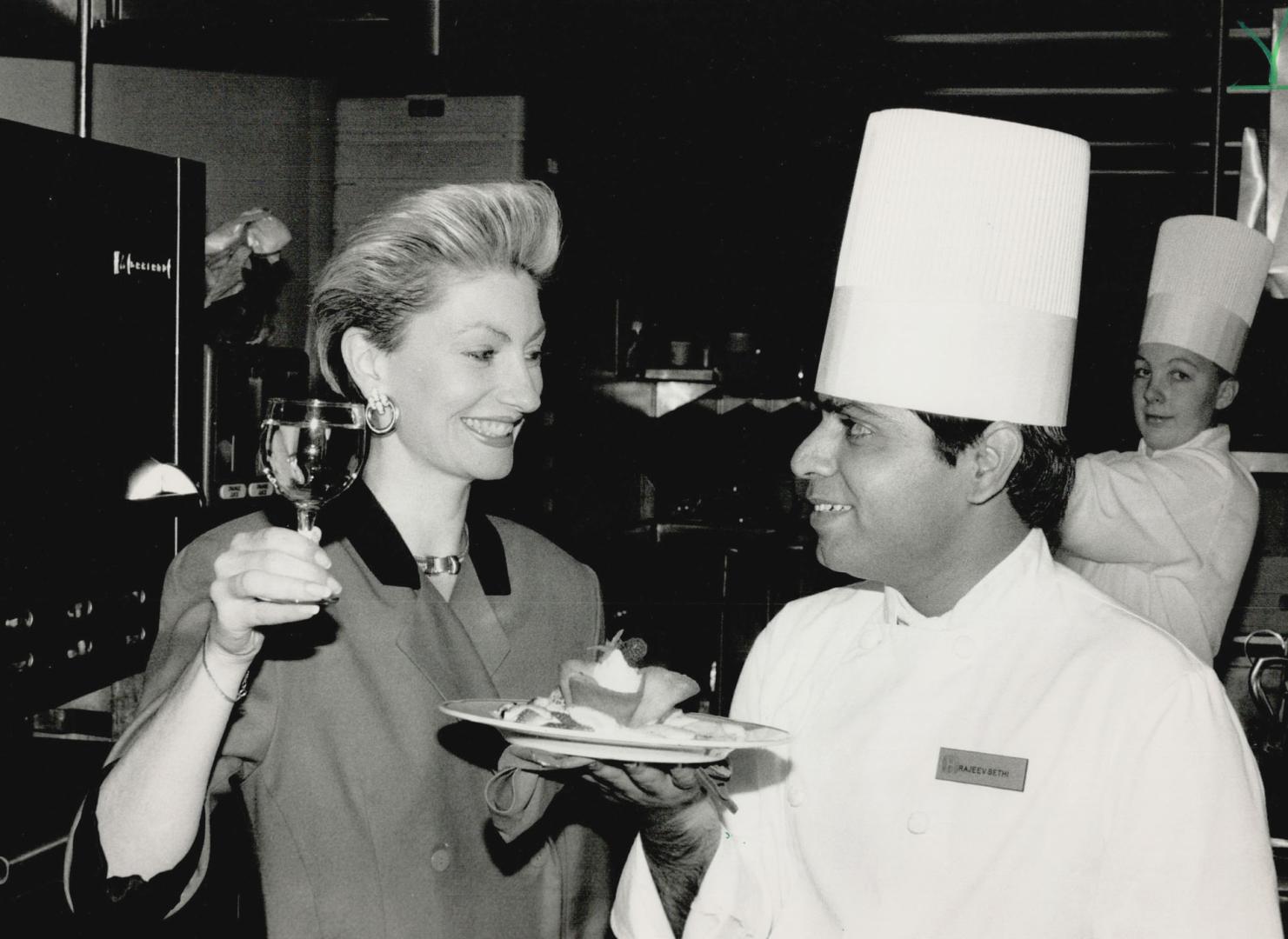 Winning ways: Mouton-Cadet Menu Competition winner Rajeev Sethi is toasted by Heather Strange, an Ontario representative for Rothschild