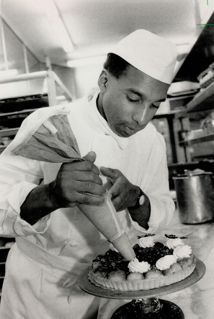 Selwyn Stoby: The pastry chef at the Four Seasons puts finishing touches to a fruit flan