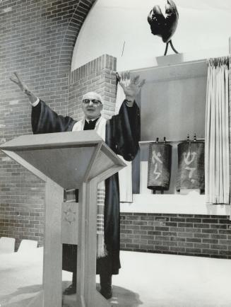 Rabbi Louis Cashdan of temple Emanu-el in traditional gesture of blessing, it's time for Judaism to return to its roots, to recapture the missionary spirit