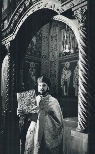 Day to Celebrate: Rev. Bohdan Hladio, associate pastor of St. Nicholas Ukrainian Catholic Church on Queen St. W., prepares for tomorrow's Christmas Eve midnight mass