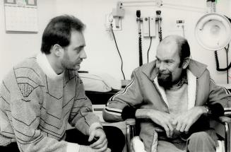 Strong support: Above, Rev. John D Martin with patient David McQueen, right