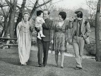 Shinmuk and Chairin Moon are seen with daughter-in-law Cathy, son Young and granddaughter Deborah