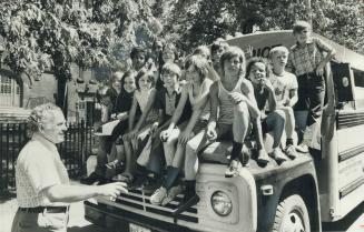 Helping the needy: Rev. Albert Vickers of Davenport-Perth United Church sometimes takes the wheel of his church's bus, Sweet Chariot. He and members o(...)