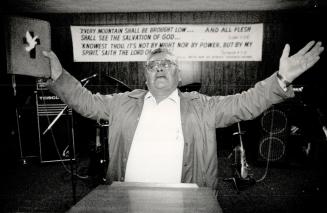 'Get right with God': Rev. John Whiskeychan leads his congregation in some old-time revival worship in a Cree Pentecostal church. Religion is now a st(...)