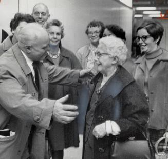 Embracing each other at Toronto International Airport last night, Maurice Elder, of Hull, Eng, and sister Mrs