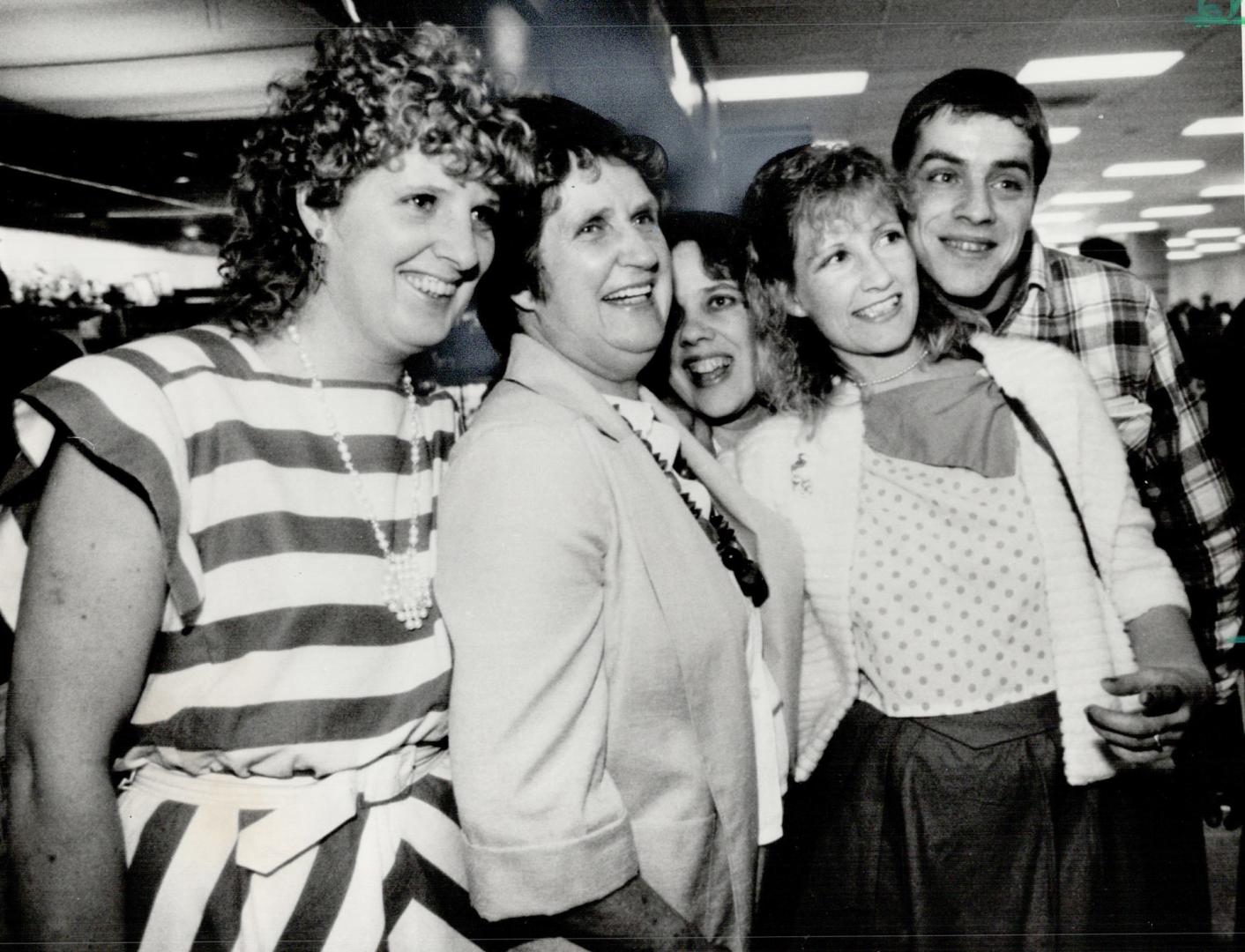 A happy Doris Crewe (second from left) was reunited at Pearson Airport last night with two daughters she hadn't seen in 25 years - Diane Smith of Durh(...)