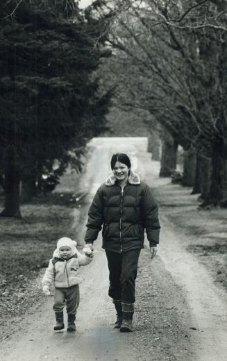 Farmer-mother: Patti Alsop went to university for a veterinarian's degree and returned a farmer she won't consider any other life for daughters Meghann, 2, (above) and Jessie, 6 months