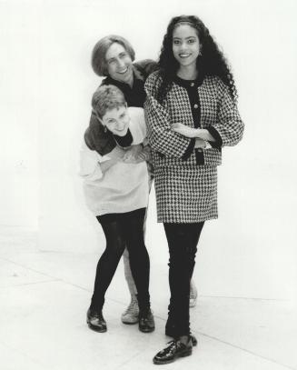 Personable duo: Lesley Foster, 27, and her partner Leslie Handy, 30, the pair behind the label Quasi, pose with model sporting thier houndstooh cropped jacket and matching skirt over black leggings